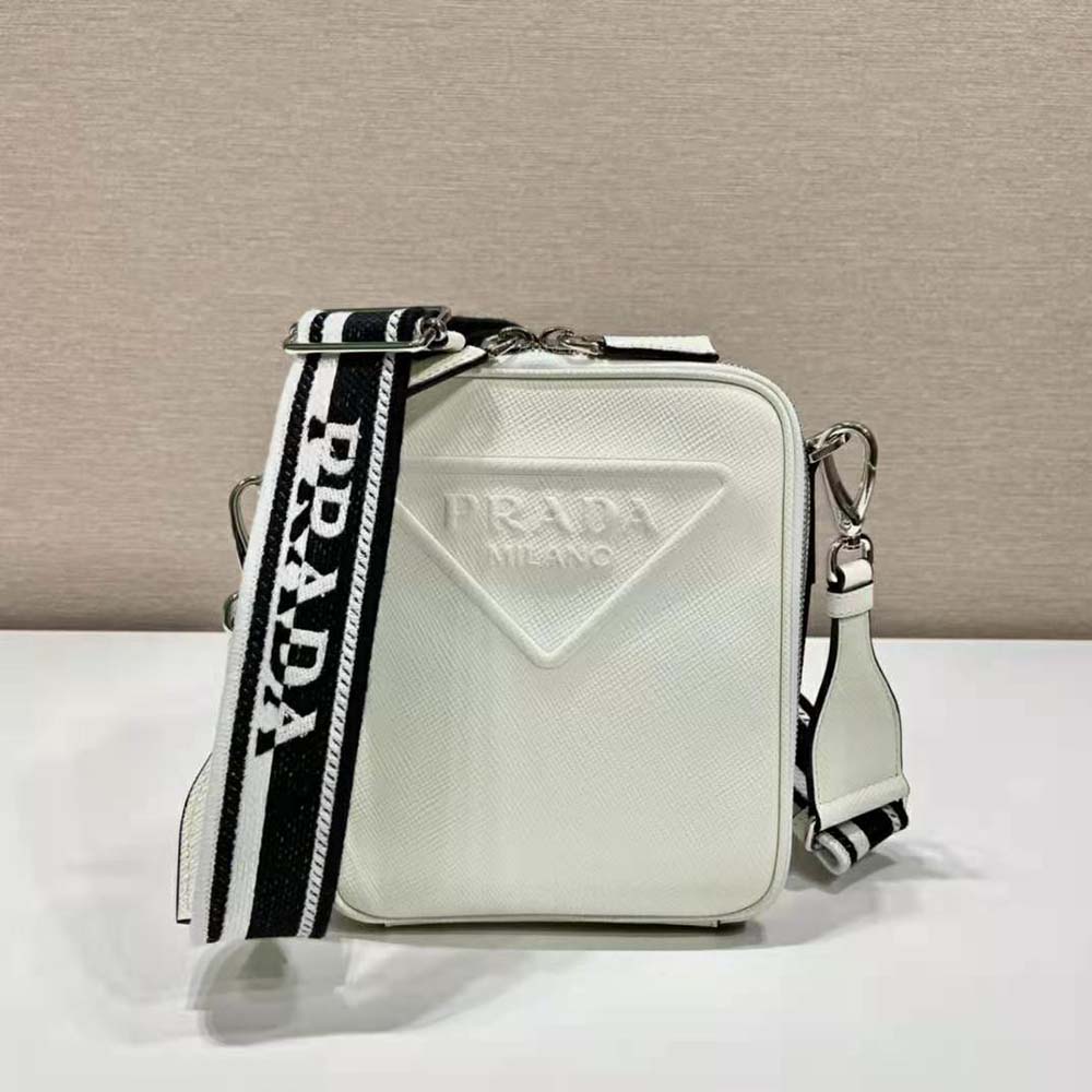 Side profile showing slim silhouette of Prada Men Saffiano Leather Shoulder Bag with Sleek-White