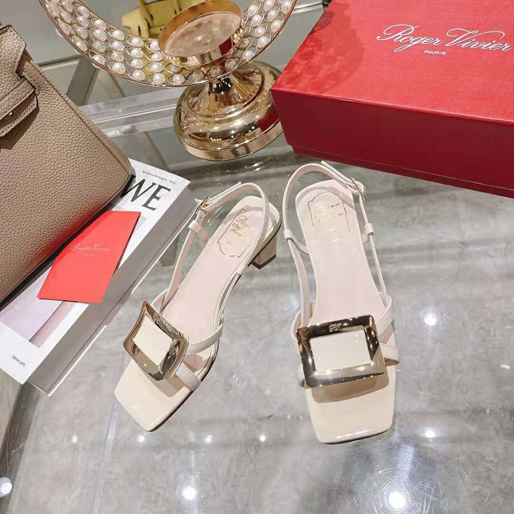 Close-up of signature metal buckle on Roger Vivier Women Belle Vivier Metal Buckle Sandals