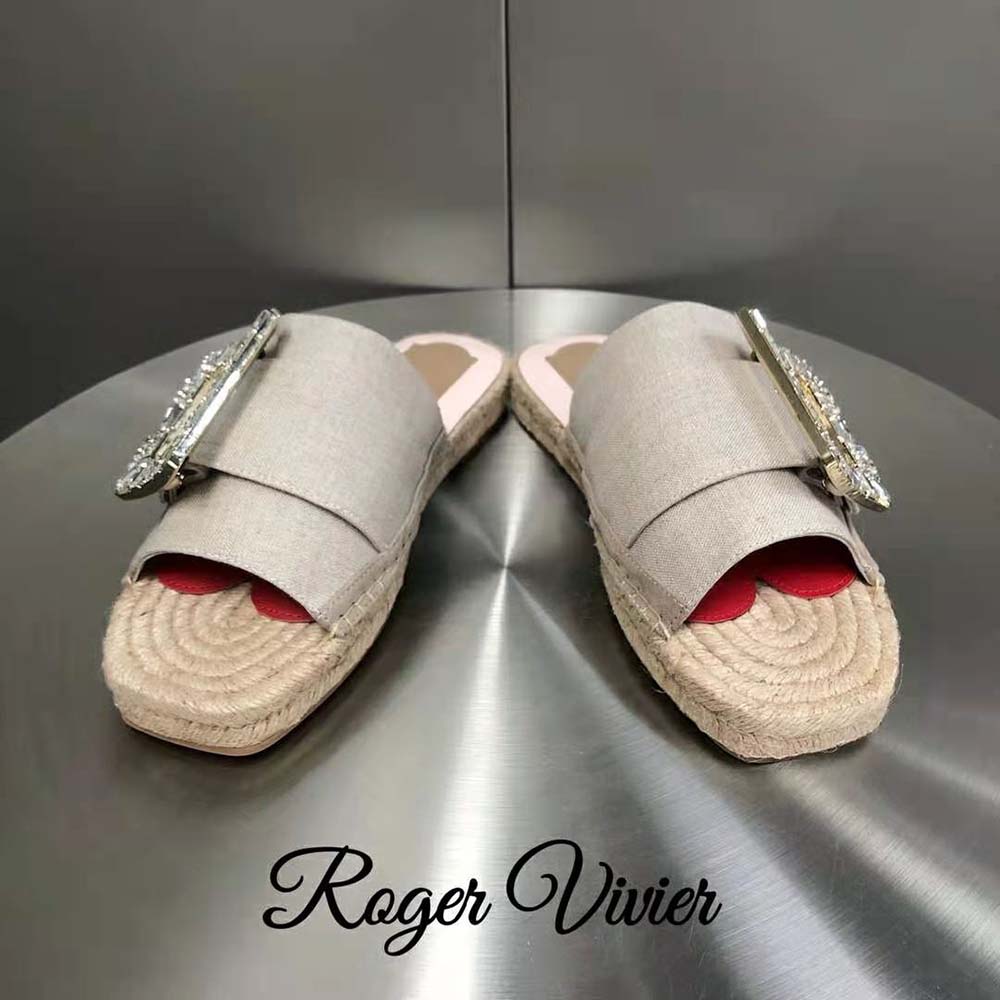 Close-up of signature strass buckle on Roger Vivier espadrille mules