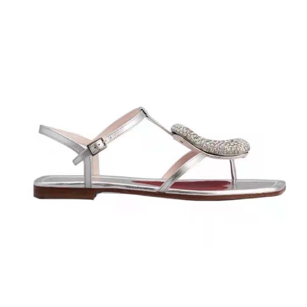 Side view of Roger Vivier Women Viv Choc Strass Buckle Thong Sandals silver leather