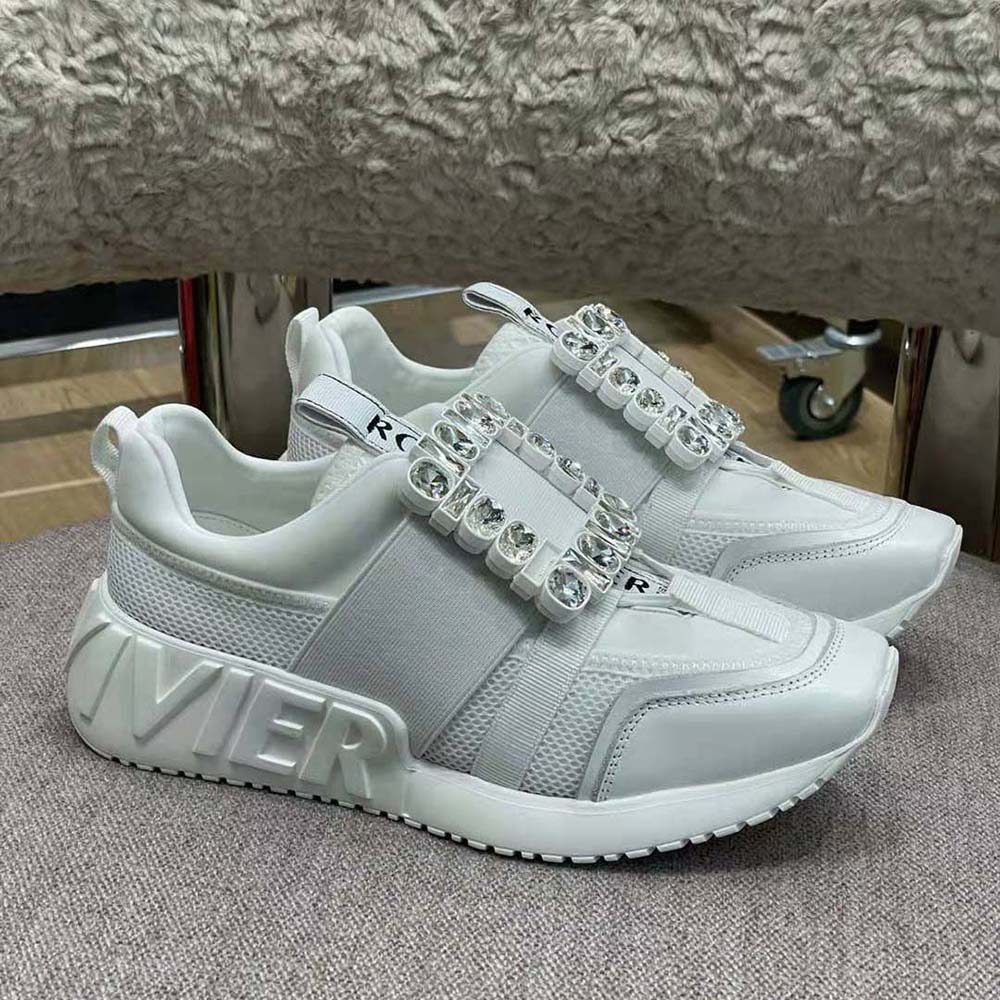 Close-up of rhinestone buckle on Roger Vivier Viv Go Sneakers