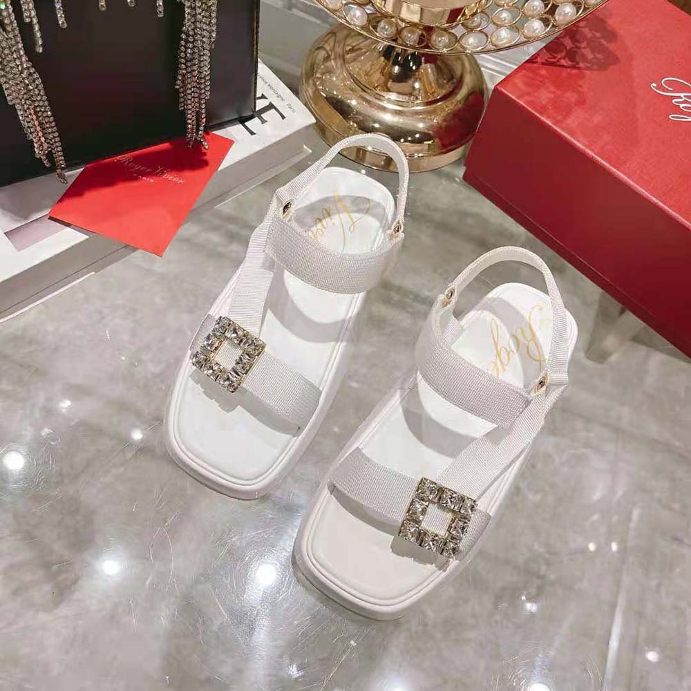 Close-up of sparkling strass buckle on Roger Vivier Vivier Slide Trekky sandals
