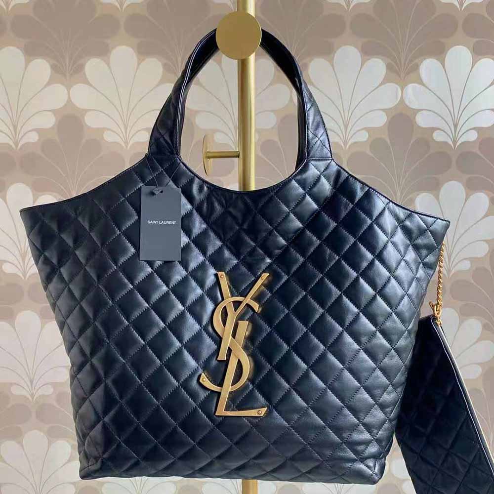Close-up of gold YSL logo and quilted lambskin texture on Icare Maxi Bag