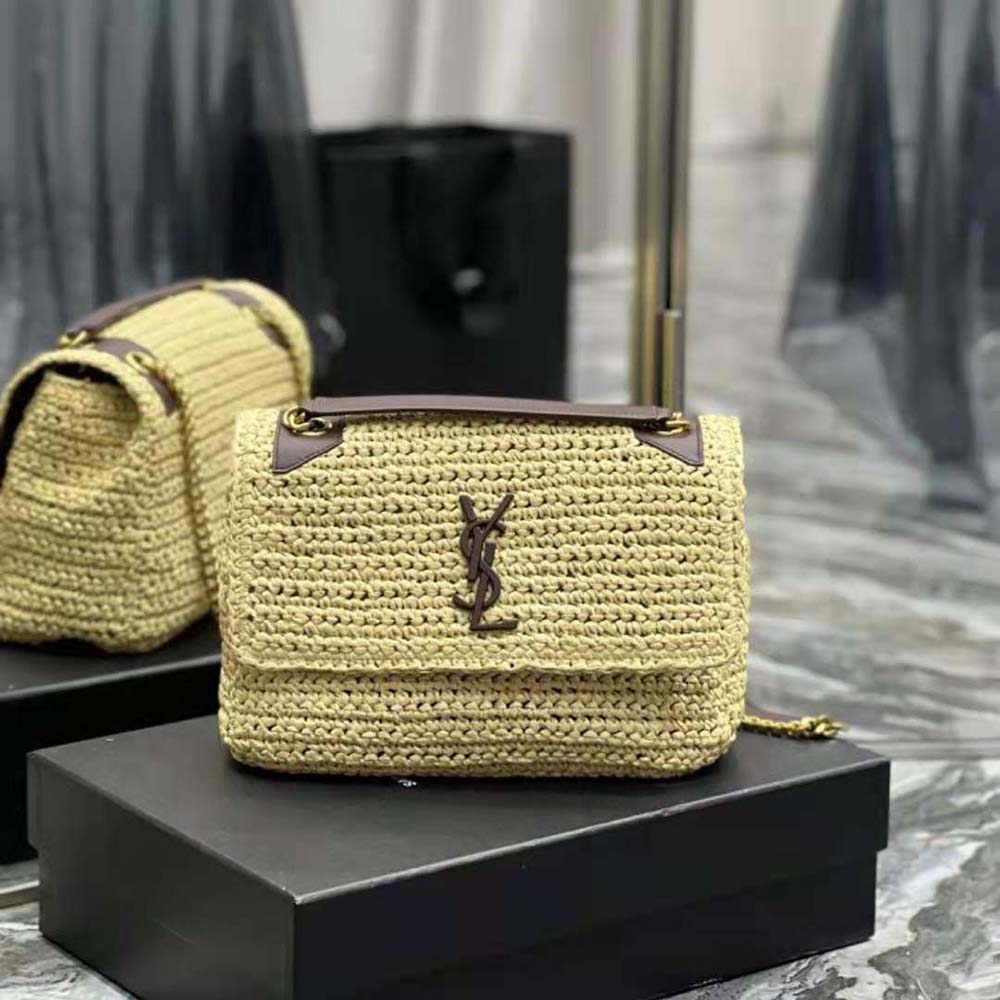 Close-up of gold YSL chain hardware on Saint Laurent YSL Women Niki Medium Chain Bag