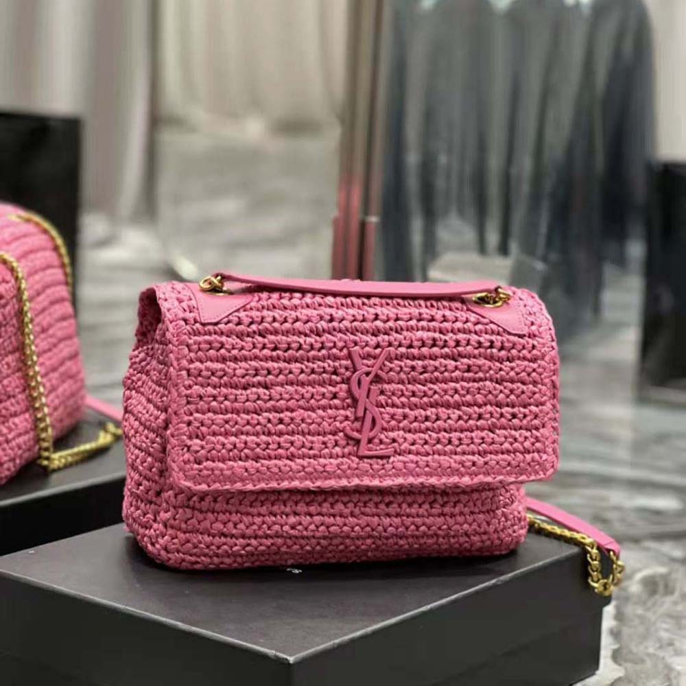 Side angle showing texture and structure of Saint Laurent YSL Niki Medium Bag