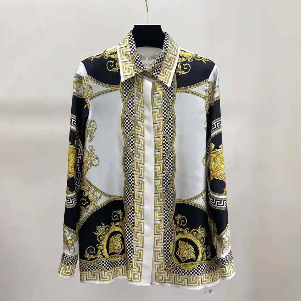 Close-up of gold Medusa cuff detail on Versace Women La Coupe Des Dieux Silk Shirt