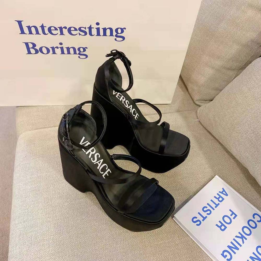 Top angle showing adjustable buckle on Versace Women Triplatform Sandals black