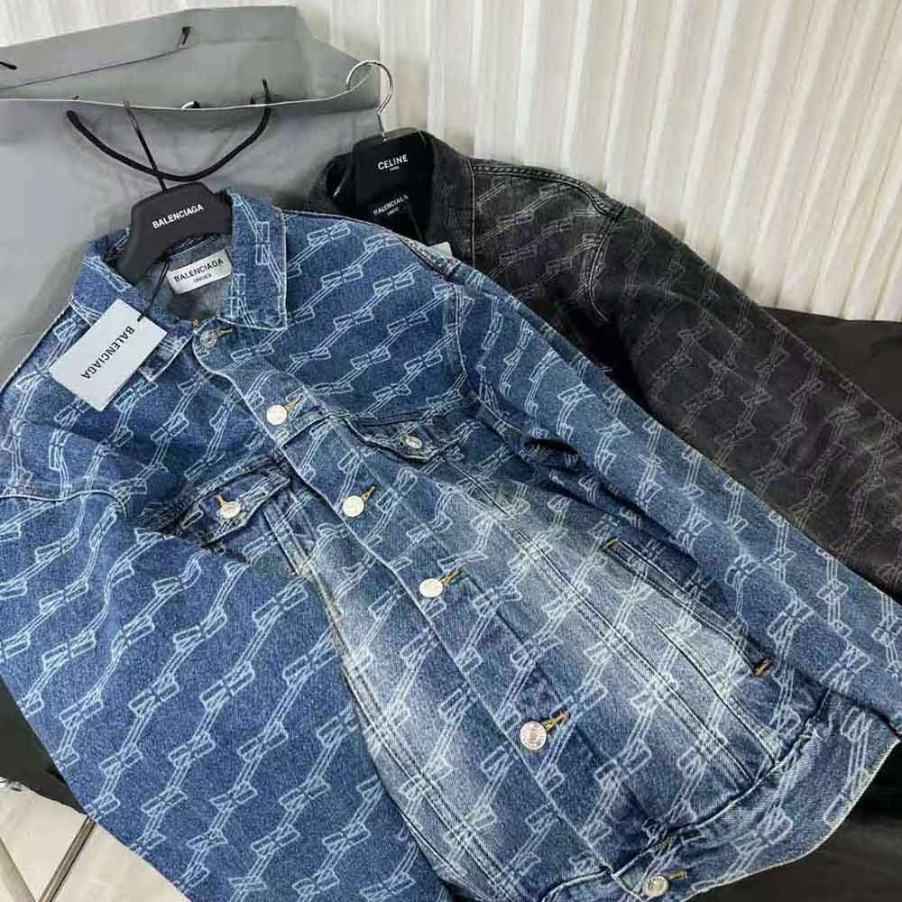 Close-up of BB monogram hardware on Balenciaga blue denim jacket