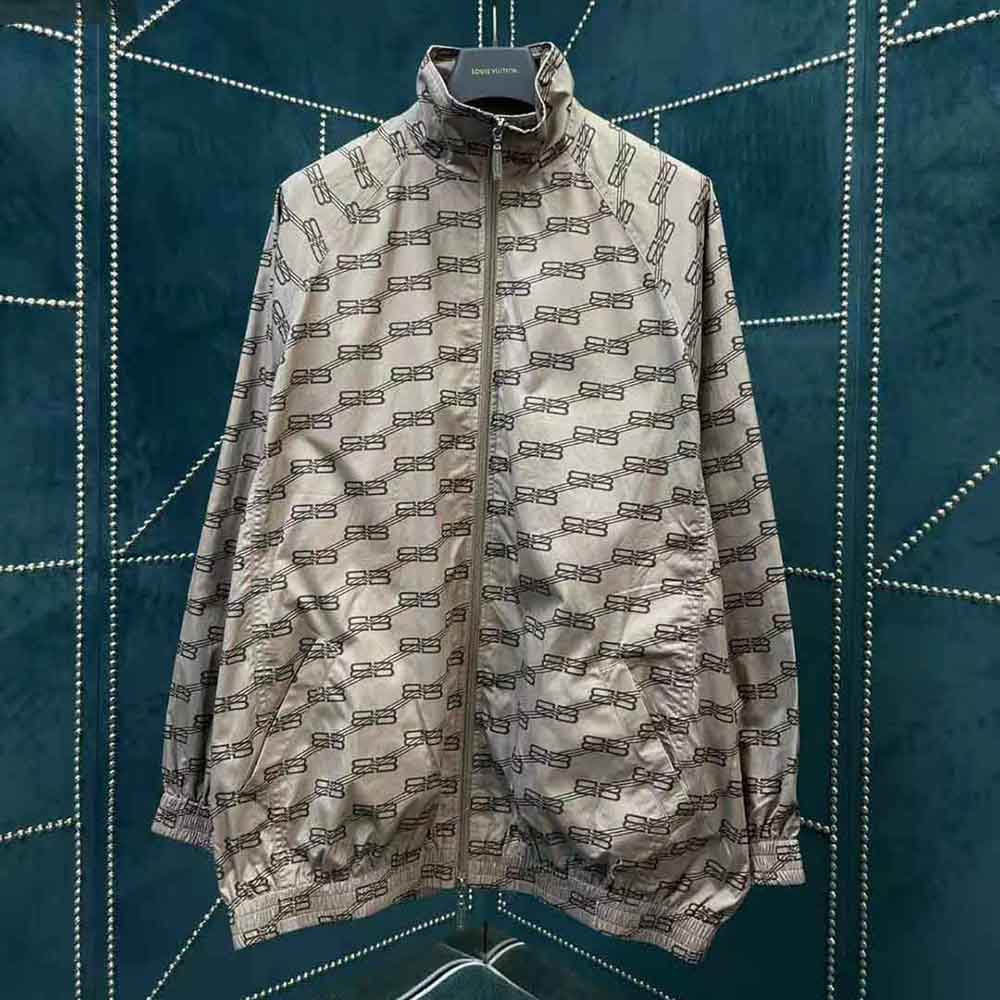 Close-up of zip closure and BB monogram detail on Balenciaga tracksuit jacket