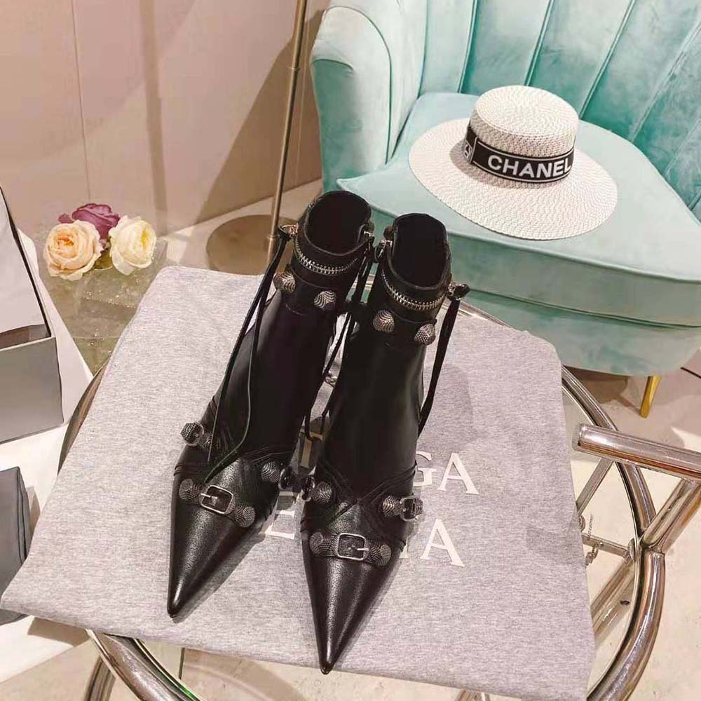 Close-up of heel and embossed logo on Balenciaga Cagole bootie