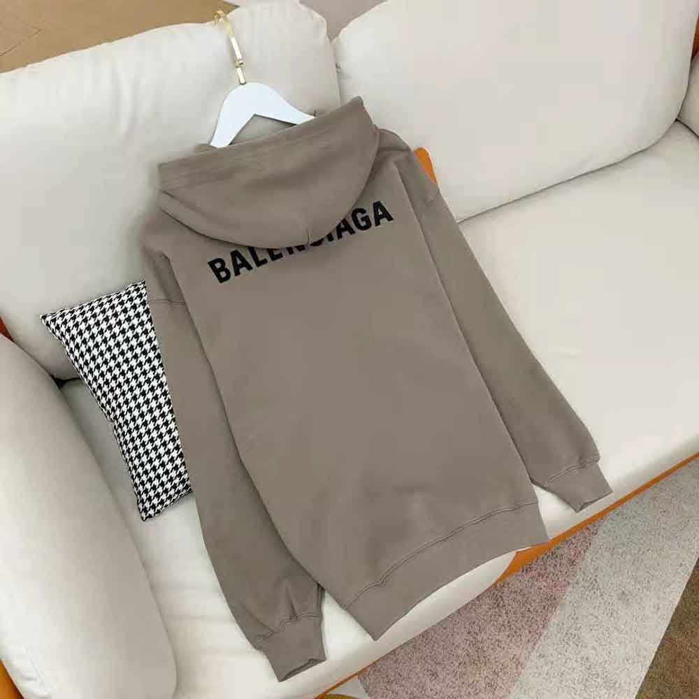 Side angle showing silhouette of Balenciaga Men Hoodie Medium Fit in contrasting colours