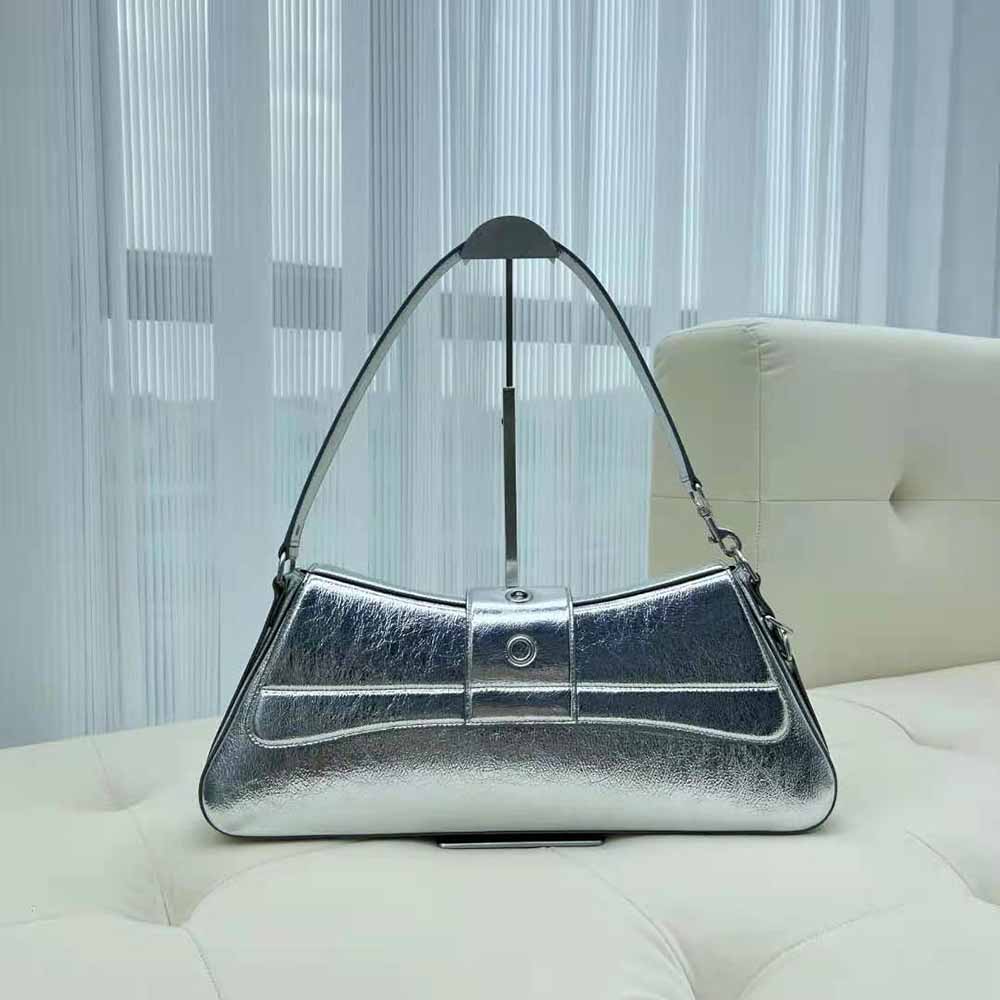 Side angle showing adjustable strap and compact shape of Balenciaga Women Lindsay Small Shoulder Bag