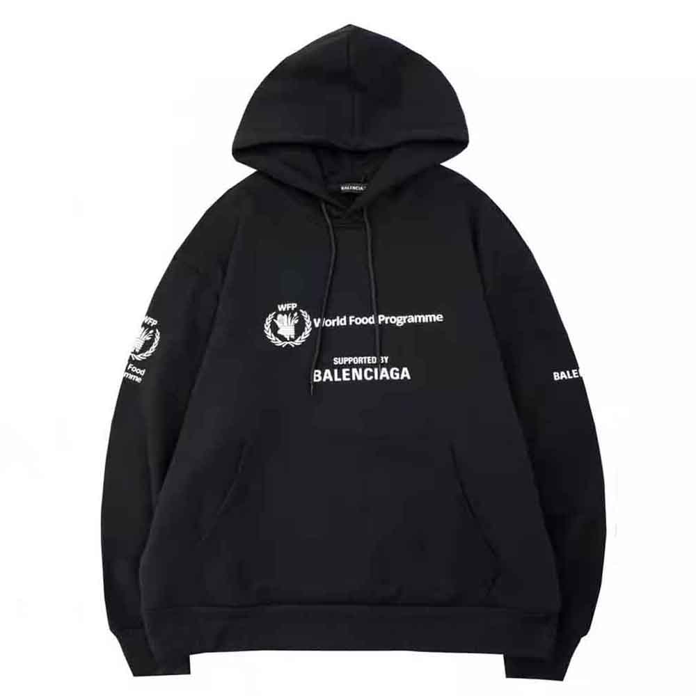 Close-up of Balenciaga logo detail on black and white medium fleece hoodie