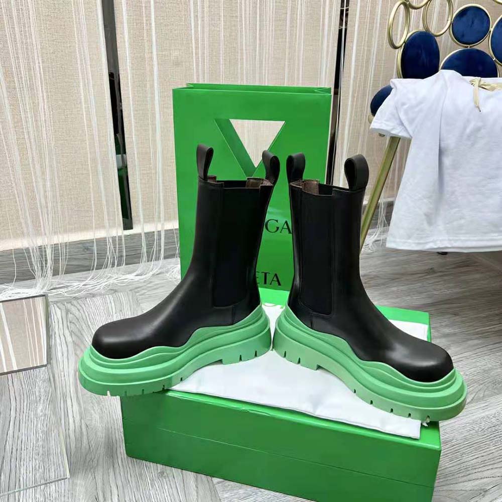 Overhead angle showing green vegetally-tanned leather and boot silhouette