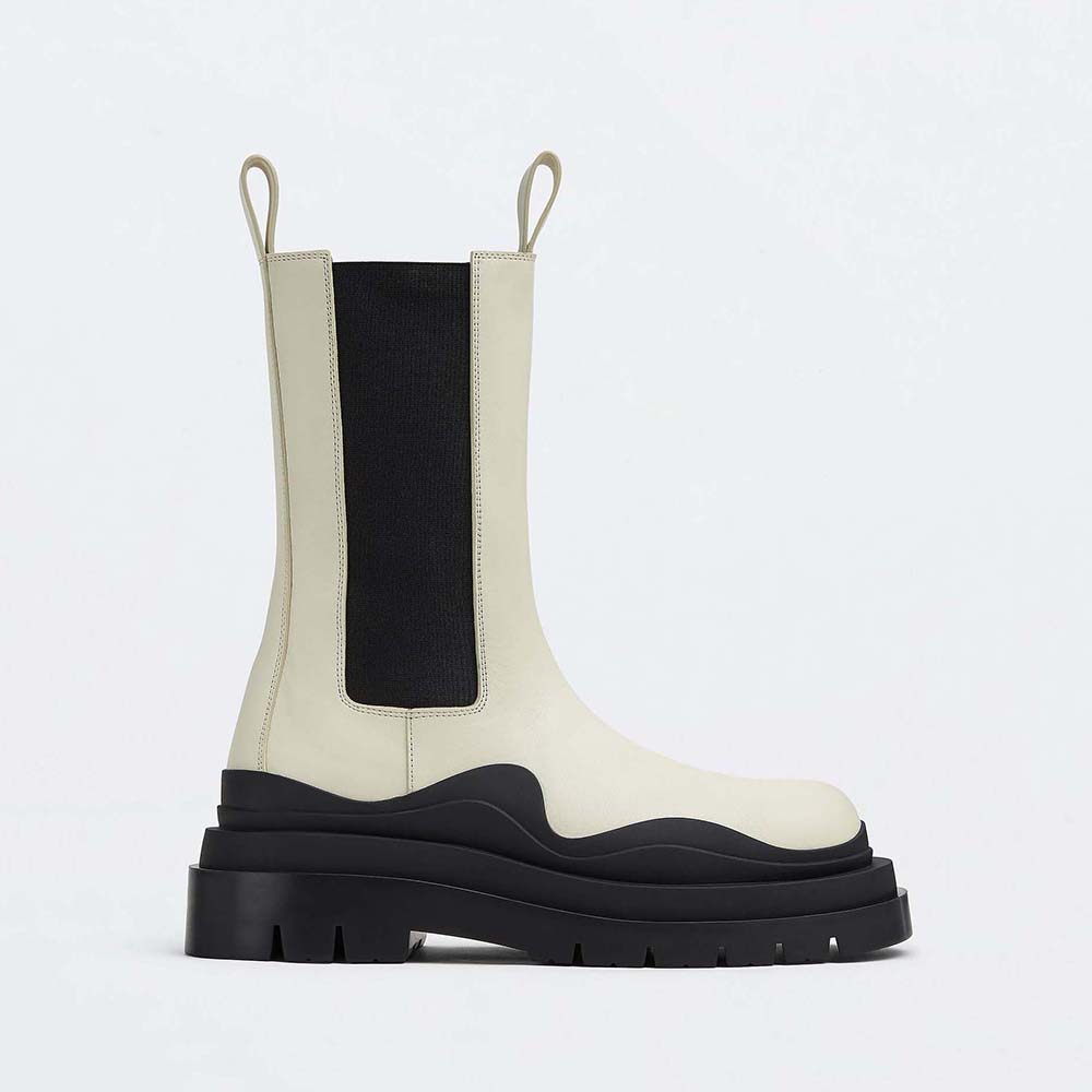 Side angle of Bottega Veneta Unisex Tire Chelsea Boot in white leather