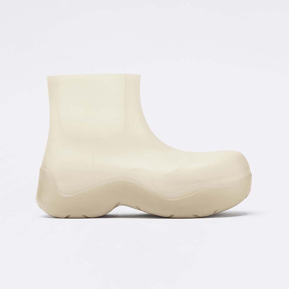 Side view of Bottega Veneta Unisex Puddle Ankle Boot-White showing woven leather
