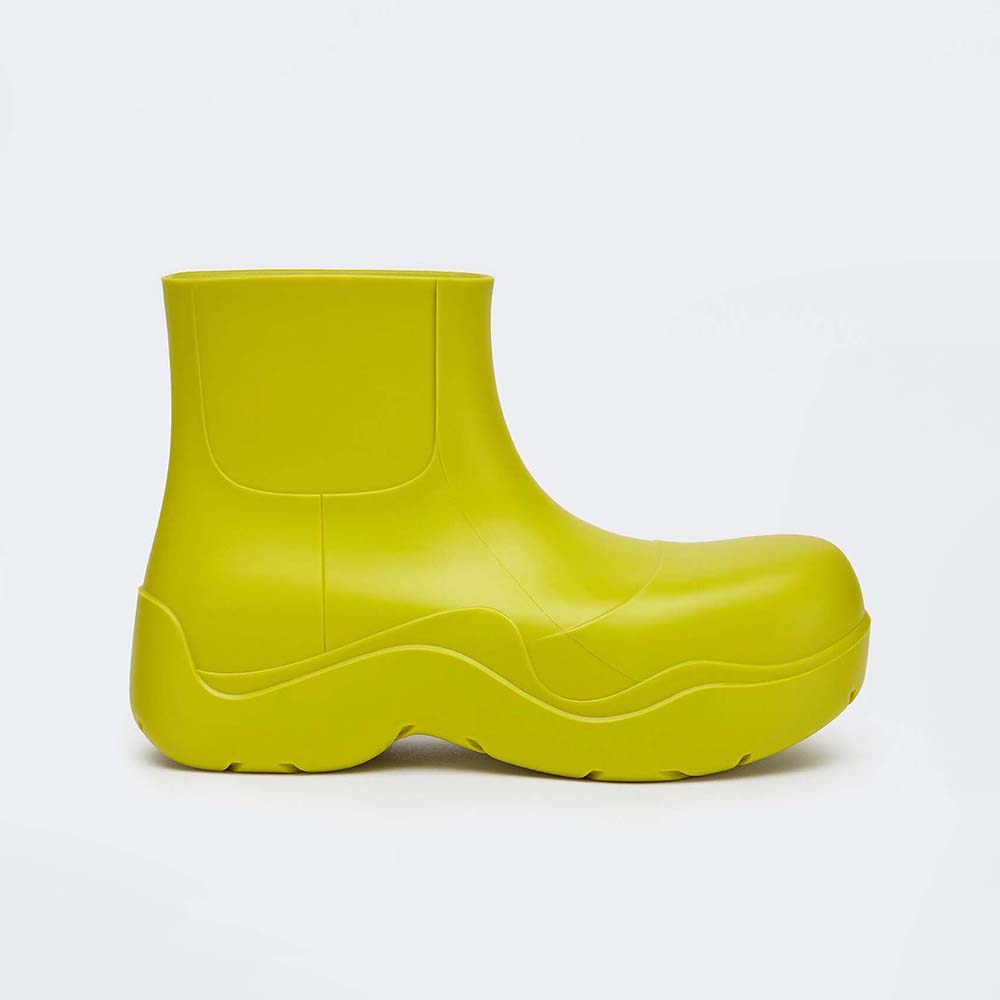 Side view of Bottega Veneta Unisex Puddle Ankle Boot-Yellow showing intrecciato detail