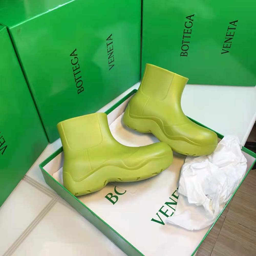 Front angle of Bottega Veneta Unisex Puddle Ankle Boot-Yellow highlighting silhouette