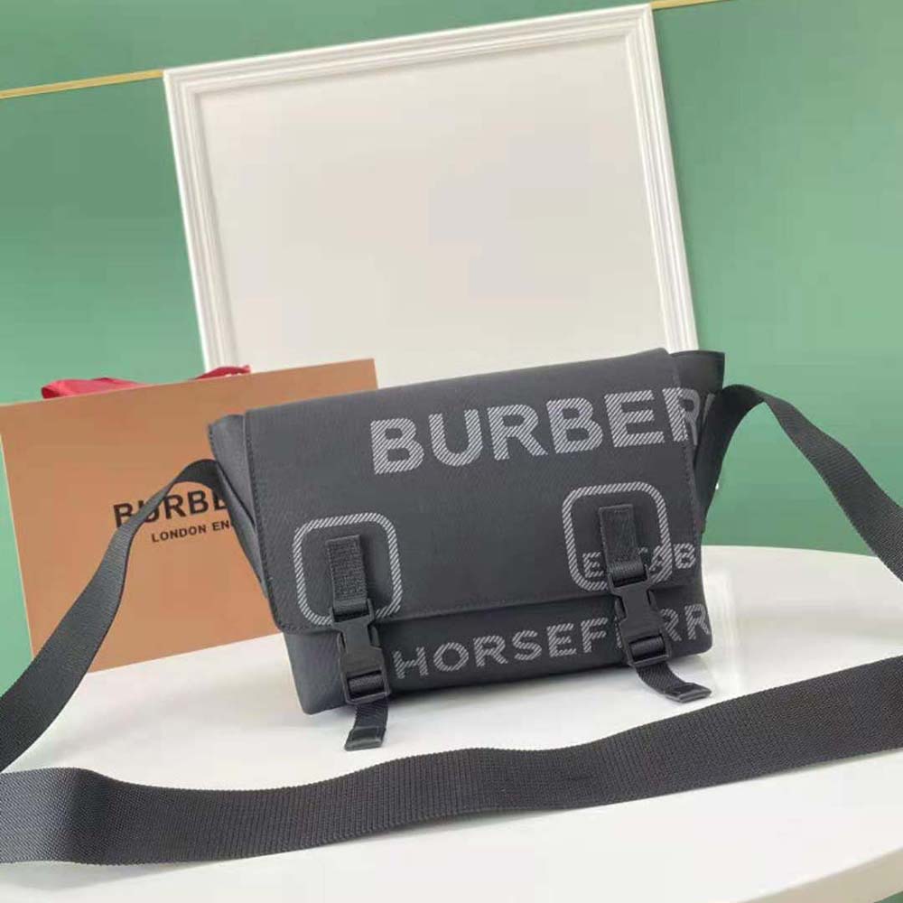 Close-up of Horseferry print and clasp on Burberry small messenger bag