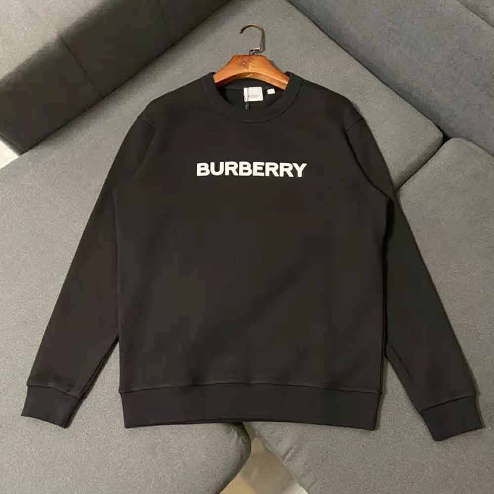 Close-up of bold logo print on Burberry Men Logo Print Cotton Sweatshirt-Black