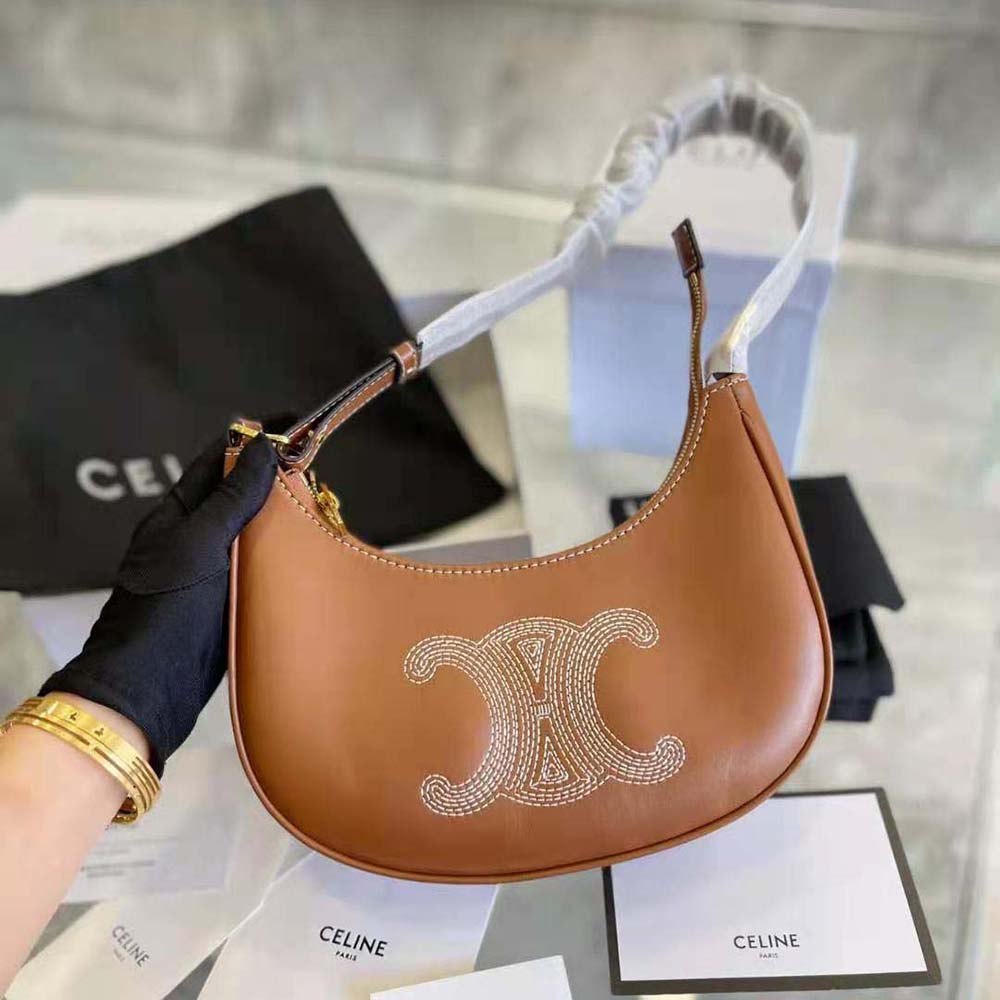 Close-up of gold-tone Triomphe embroidery on Celine Women Ava Bag
