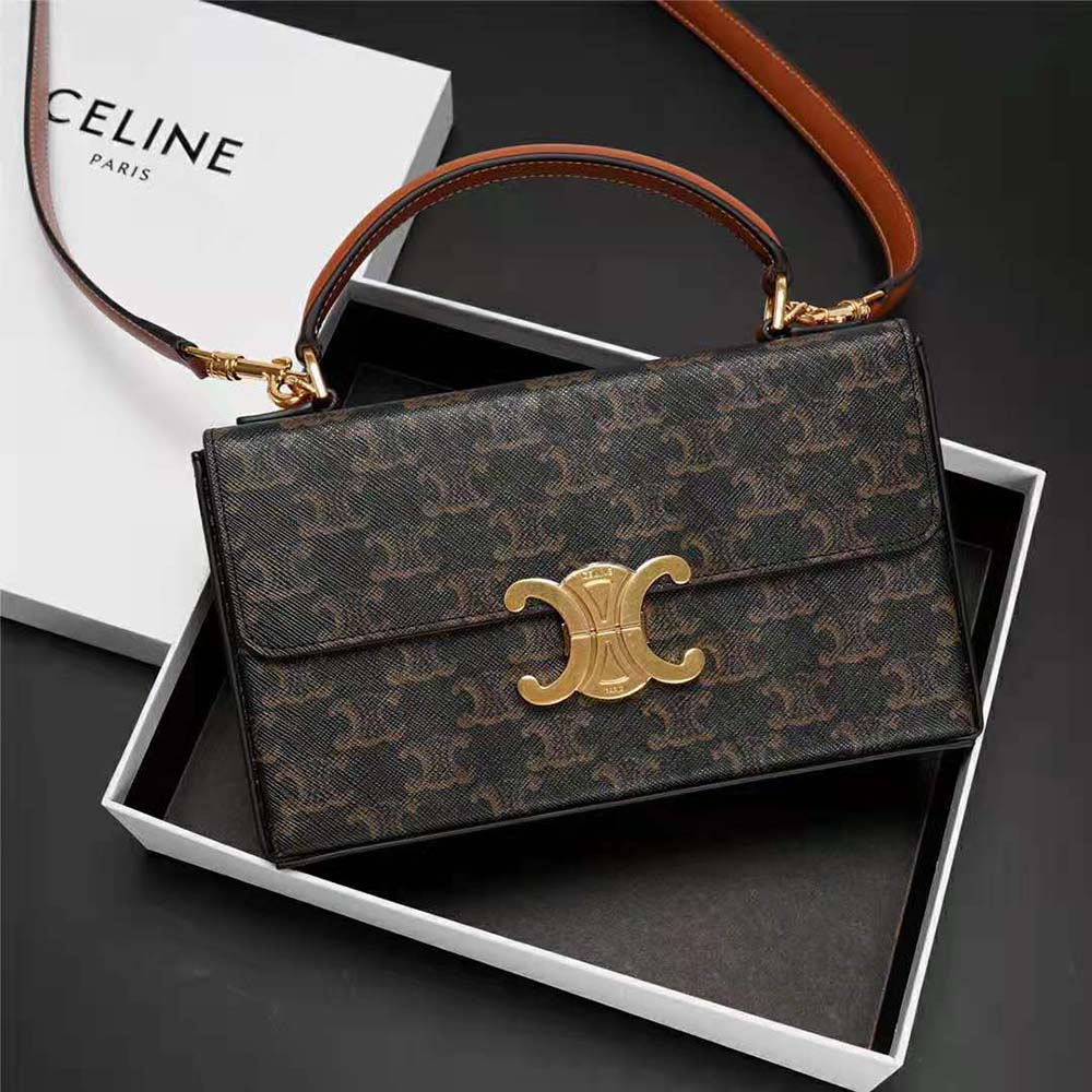 Close-up of gold Triomphe clasp on Celine Women Box Triomphe bag