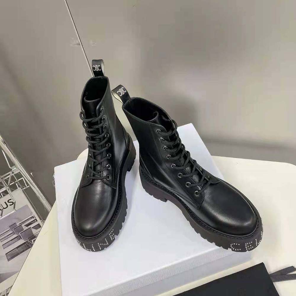 Front angle showing lace-up closure on Celine Women Lace-up Boot shiny black