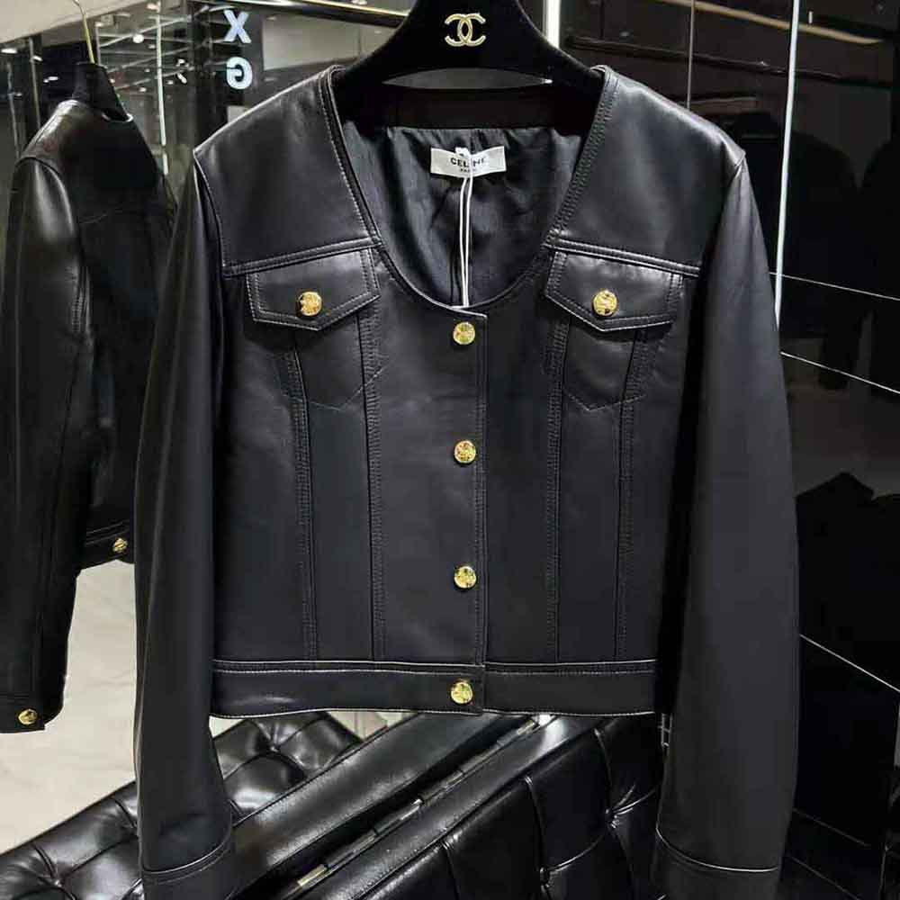 Close-up of black matte hardware on Celine scoop neck leather jacket