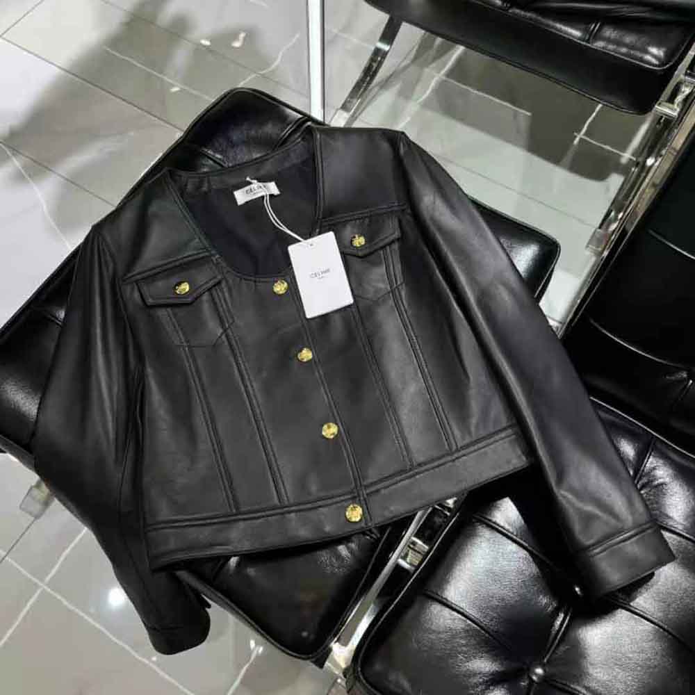 Side profile showing tailored silhouette of Celine scoop neck trucker jacket