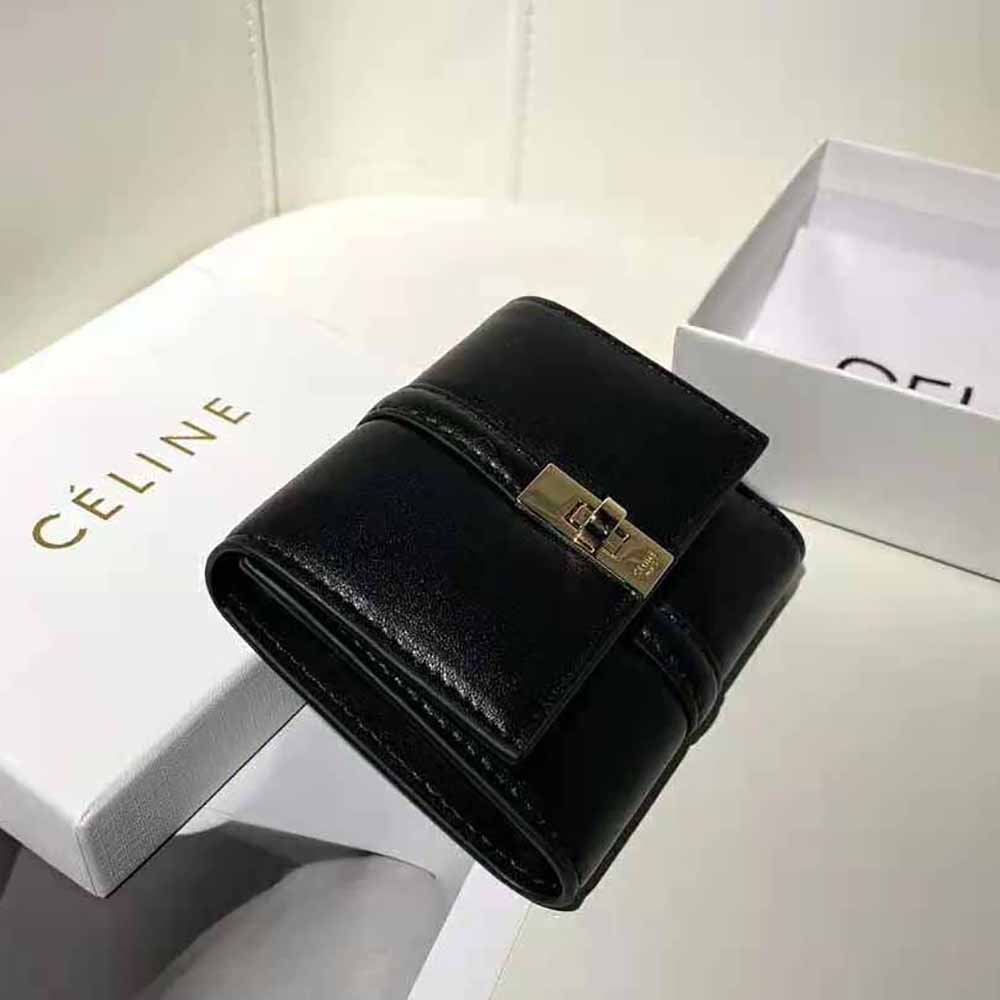 Side profile showing compact silhouette of Celine Women Small Wallet 16