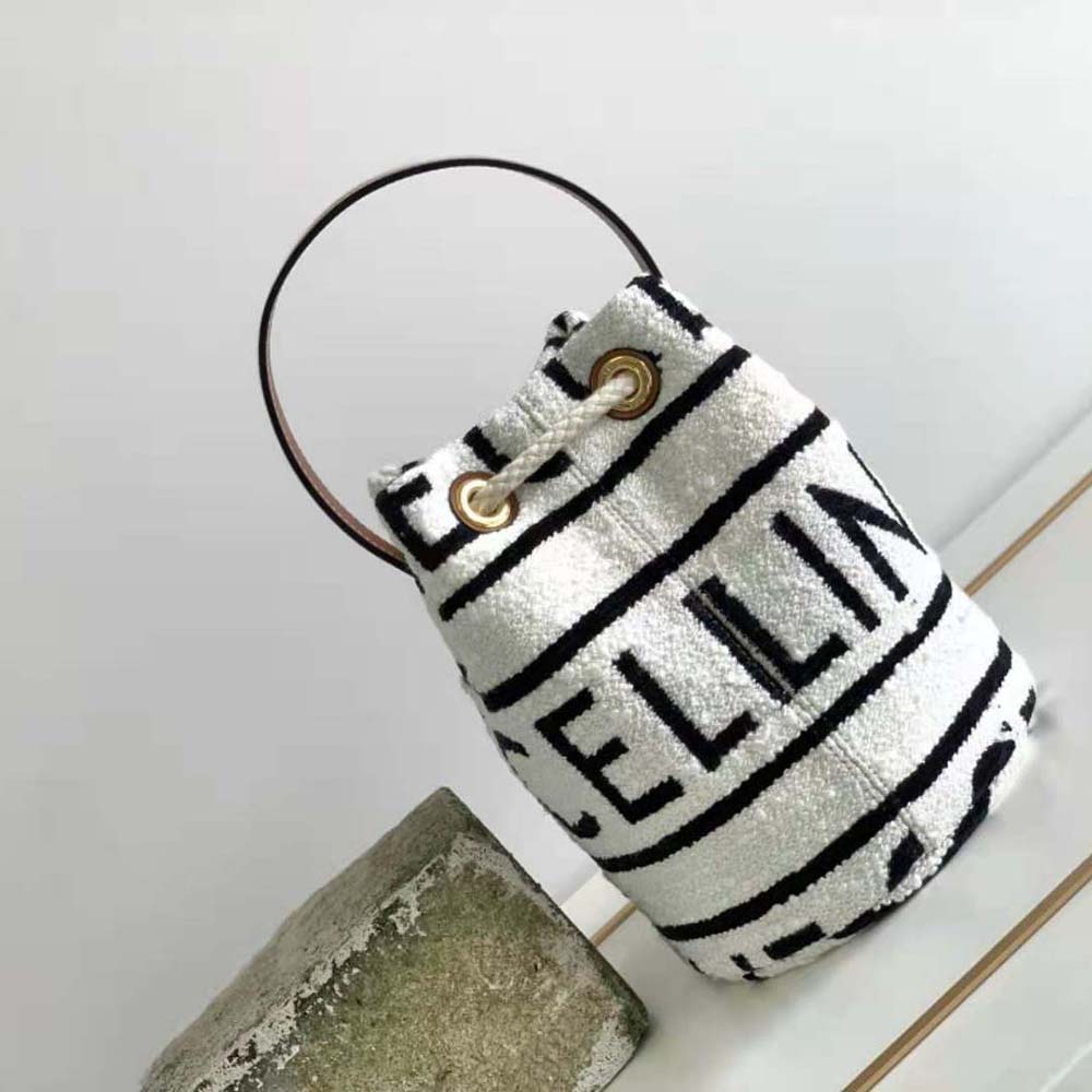 Side angle showing drawstring closure and Celine all-over textile pattern