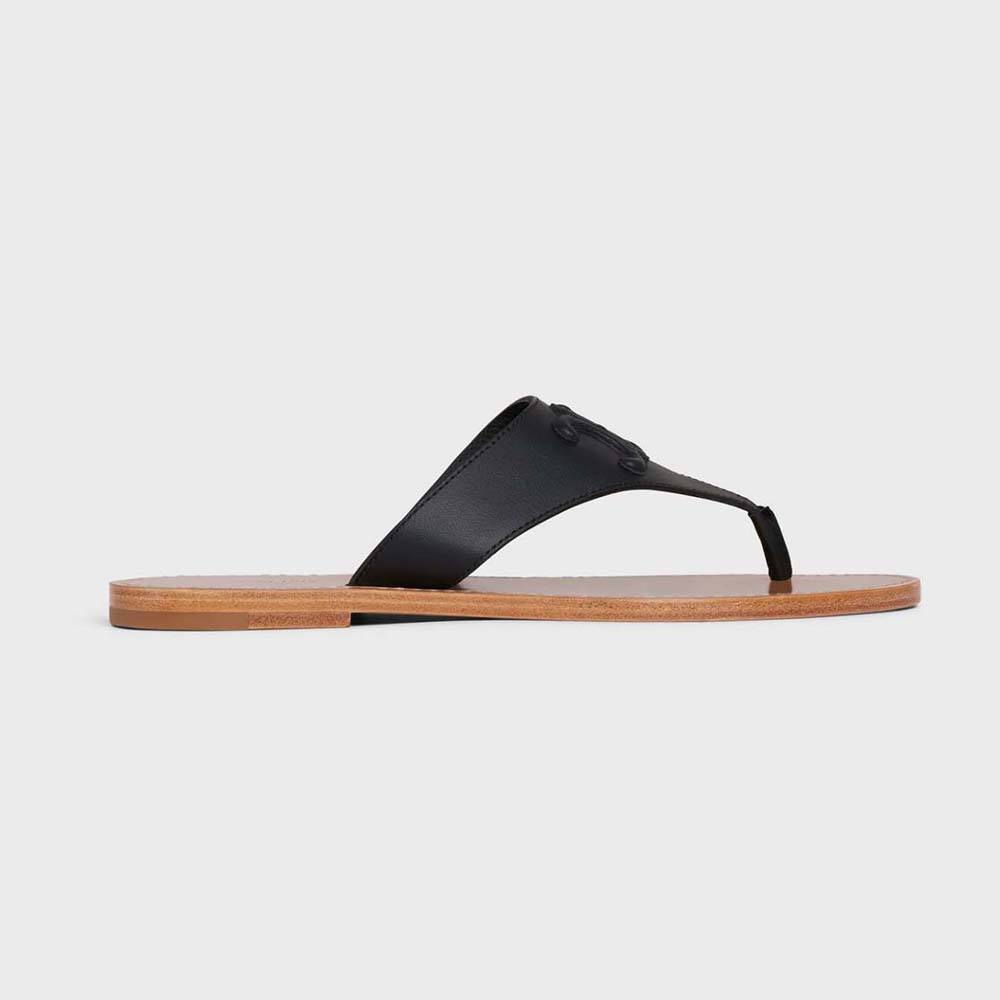 Front view of Celine Women Triomphe Flat Thong in Calfskin-Black sandal