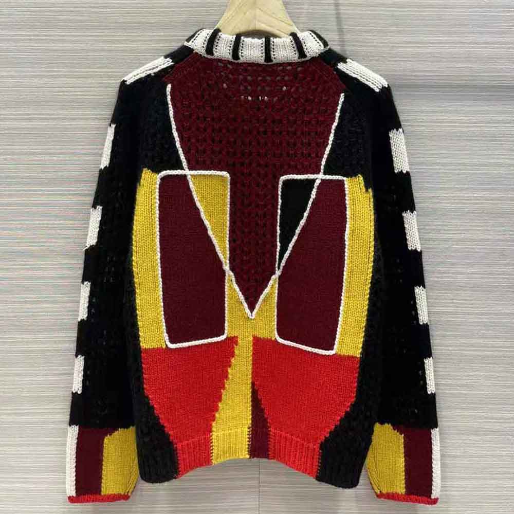 Side angle highlighting silhouette of Chloe Women Graphic Knit Sweater-Black