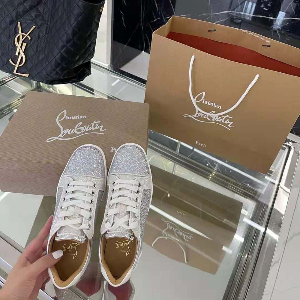 Top angle showing white leather and lace-up closure on Christian Louboutin Men Louis Junior Strass-White