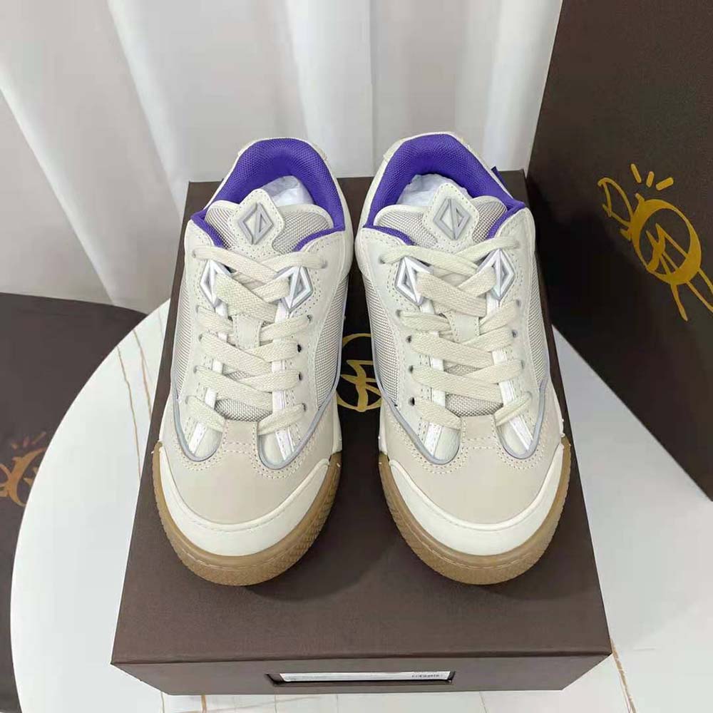 Close-up of signature Cactus Jack branding on sneaker tongue