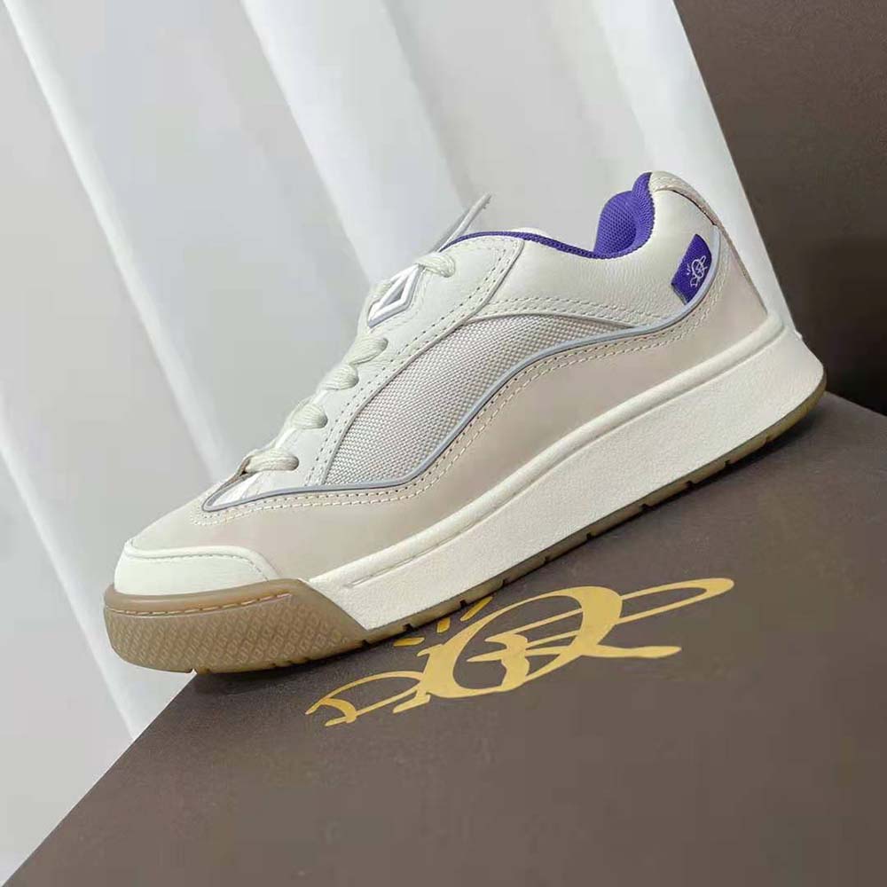 Side profile showing leather texture on Dior Men B713 Cactus Jack Dior Sneaker