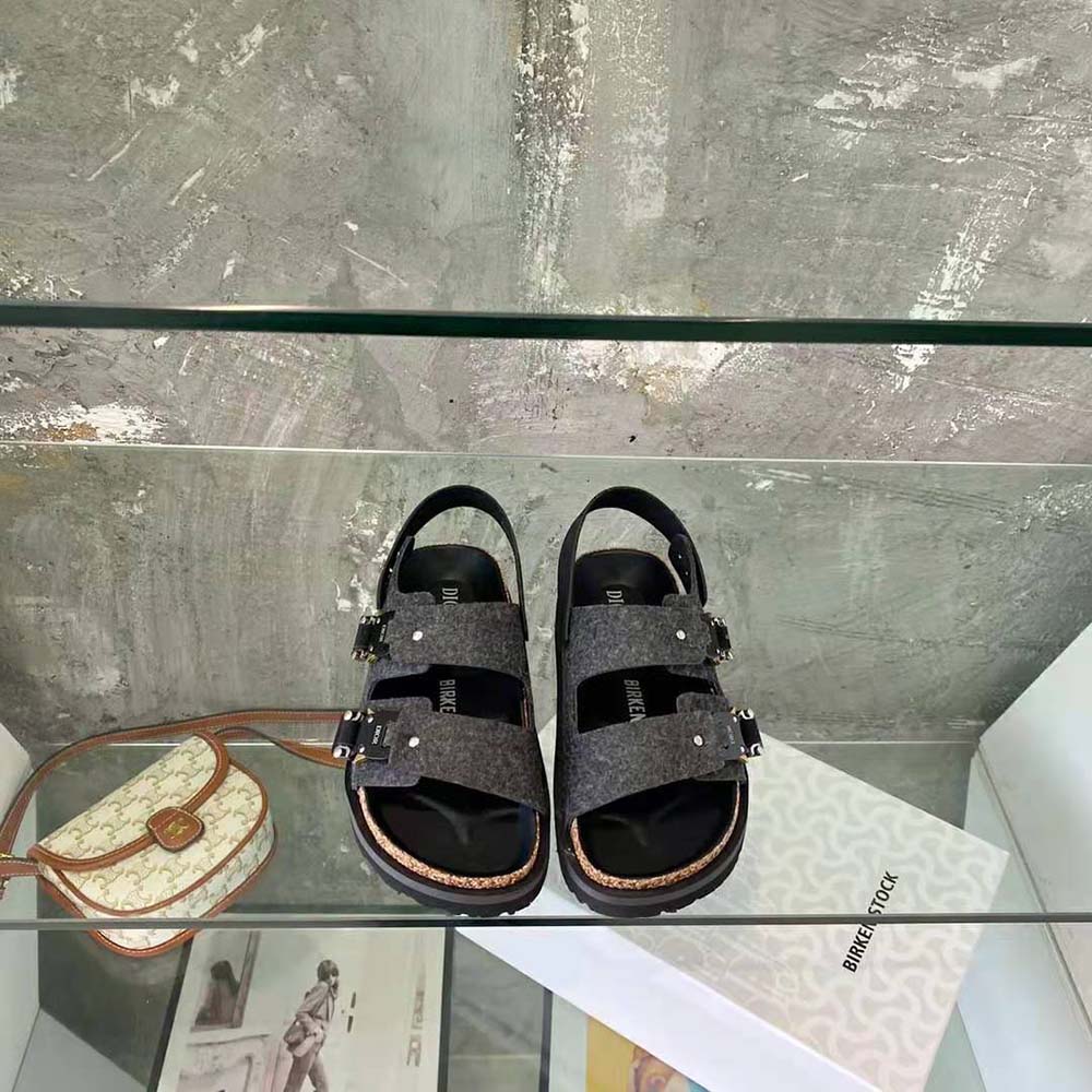 Close-up of black nubuck calfskin and metal hardware on Dior Men By Birkenstock sandal