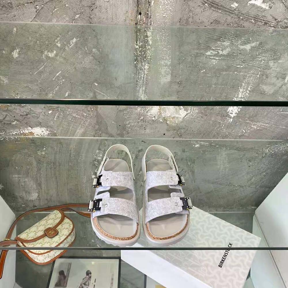 Close-up of adjustable buckle on Dior Men Dior by Birkenstock Milano Sandal in gray