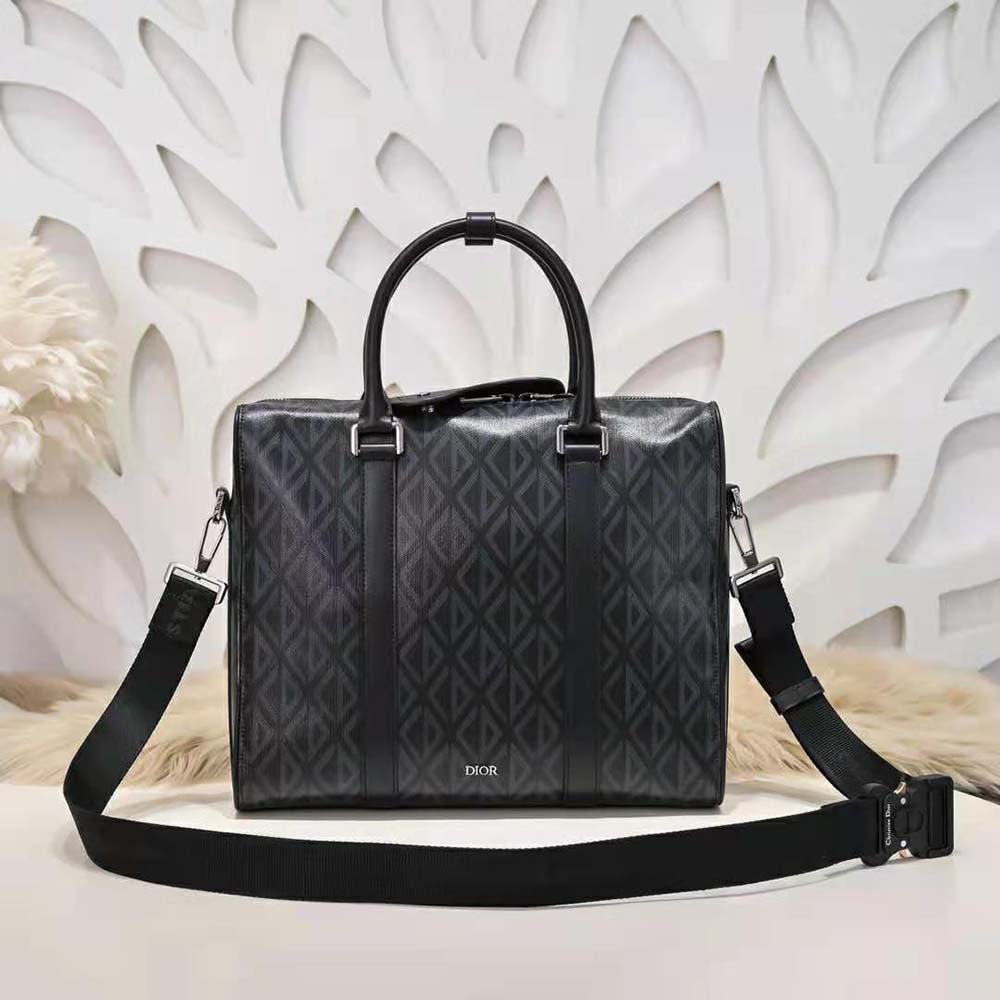 Close-up of silver-tone hardware on Dior Men Lingot Briefcase black shoulder bag