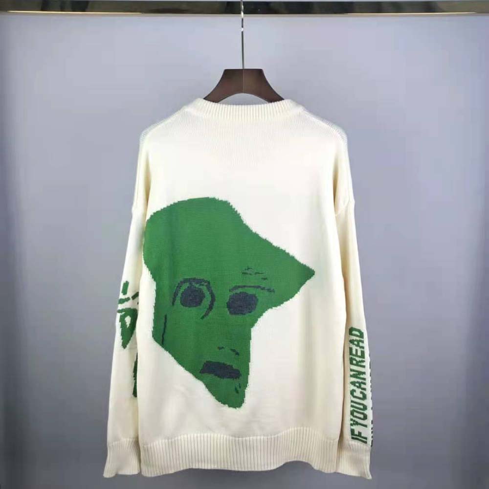 Side angle showing oversized fit and knit texture of Dior Men Oversized Cactus Jack Dior Sweater