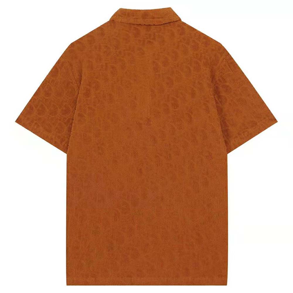 Side angle showing oversized fit of Dior Men Oversized Dior Oblique Polo Shirt