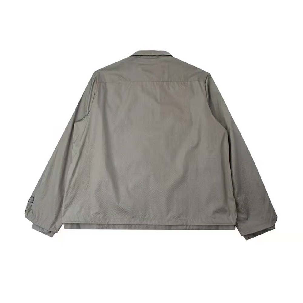 Side profile showing silhouette of Dior Men Zipped Blouson gray jacket