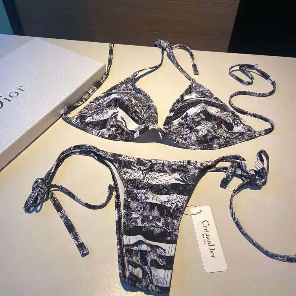 Close-up detail of navy blue stripes and Toile de Jouy on Dior bikini top