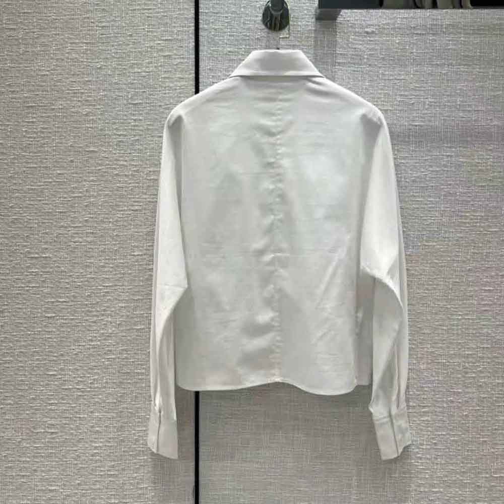 Side profile showing tailored silhouette of Dior Women Blouse White Cotton Poplin