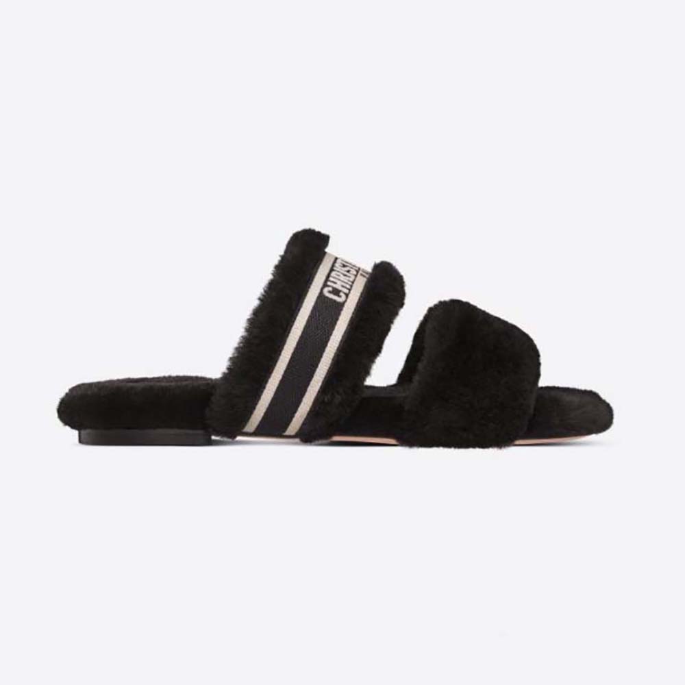 Side profile of Dior Women Chez Moi Slide White Embroidered Cotton and Black Shearling