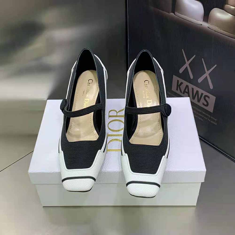 Close-up of white rubber sole and Dior logo heel detail