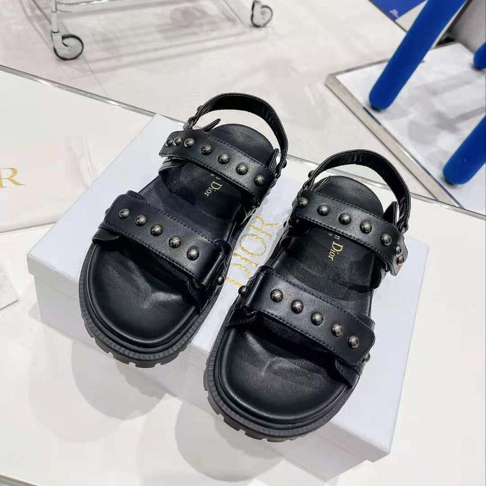 Close-up of silver rivets on Dior Women Dioract Sandal leather strap