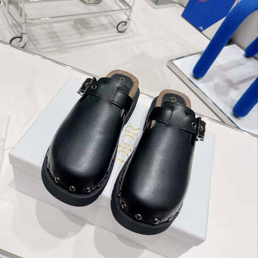 Close-up of silver Dior logo hardware on Diorquake Clog sandal