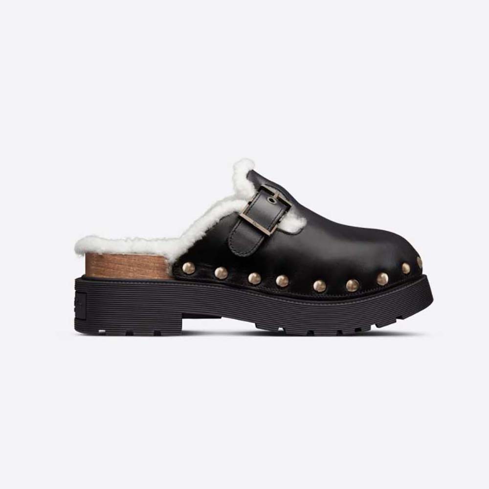 Side view of Dior Women Diorquake Clog Black Calfskin and White Shearling
