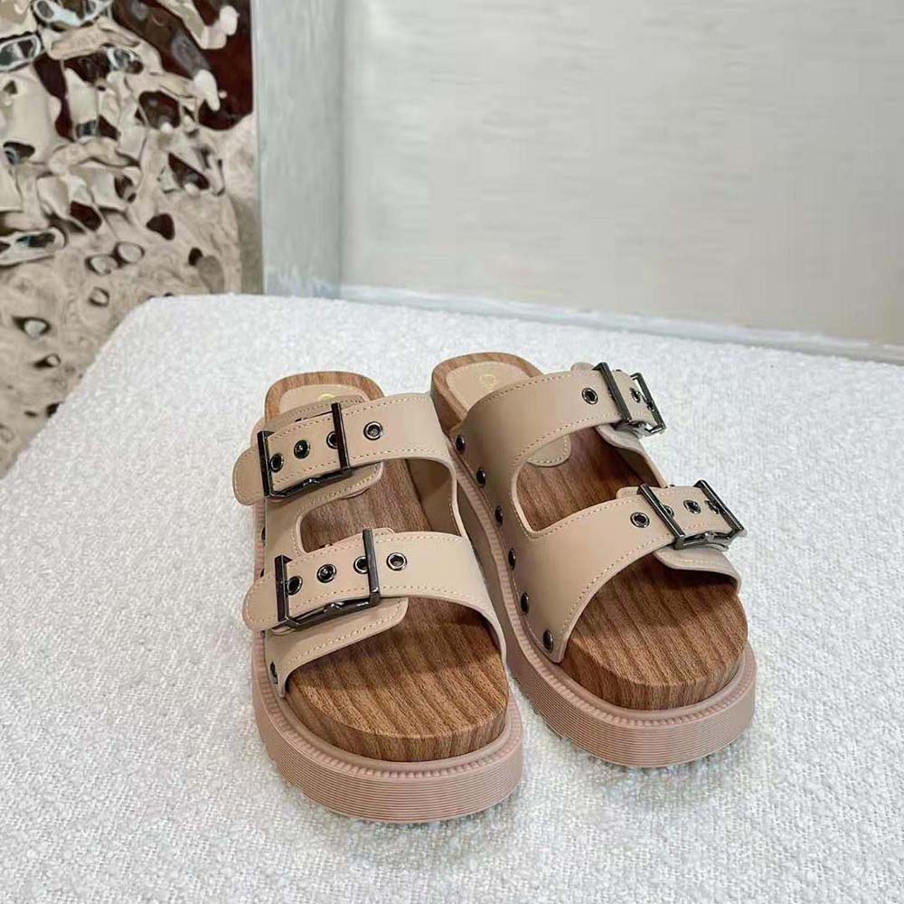 Close-up of Dior logo hardware on Diorquake Strap Sandal white calfskin